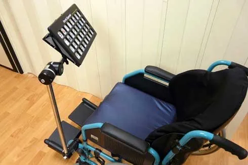 Photo: Digitised speech communication aid mounted on a wheelchair