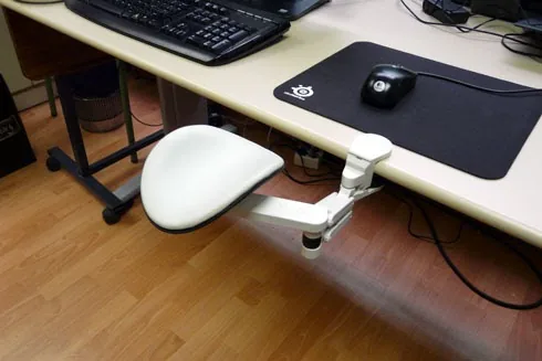 Photo: Forearm support that makes it easier to reach computer peripherals